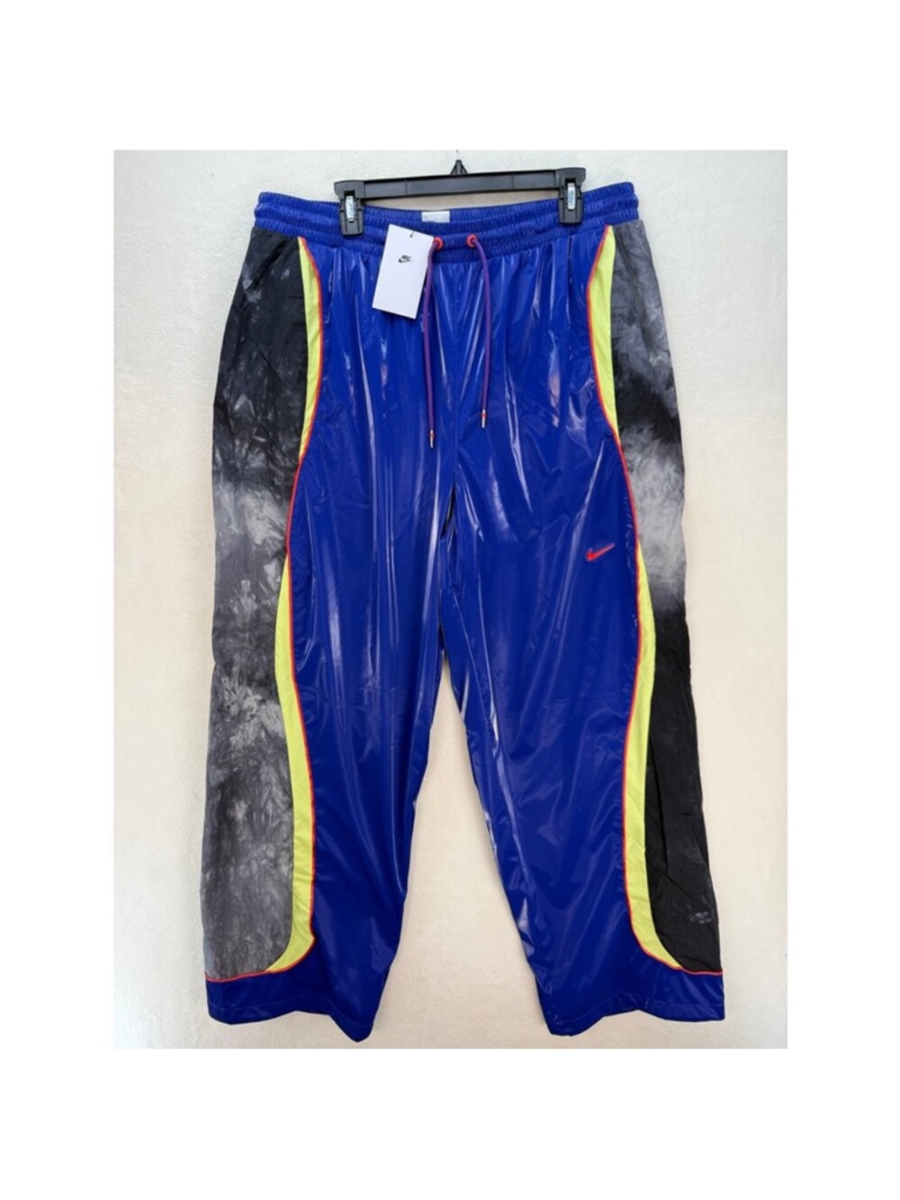 Nike Royal Blue Track Pants with Neon Yellow Trim and Red Accents
